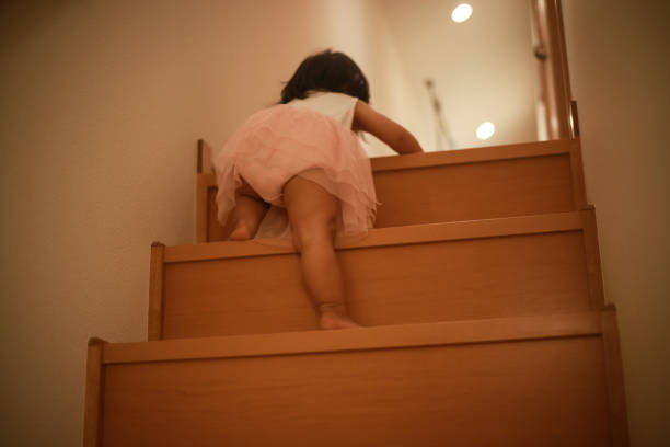 istock Girl climbing stairs alone 1292369644
