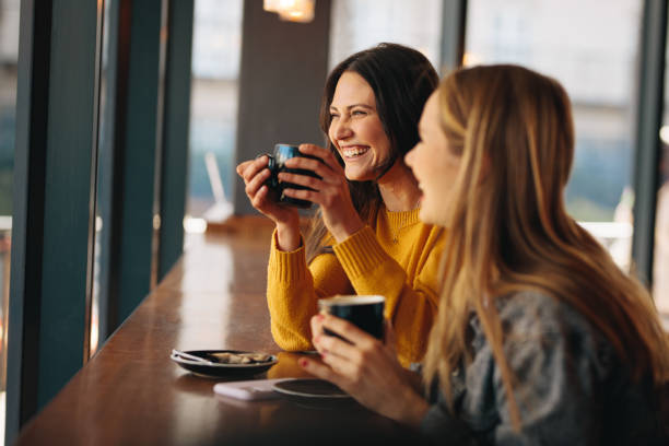 istock Friends having great time at a coffee shop 1292371880