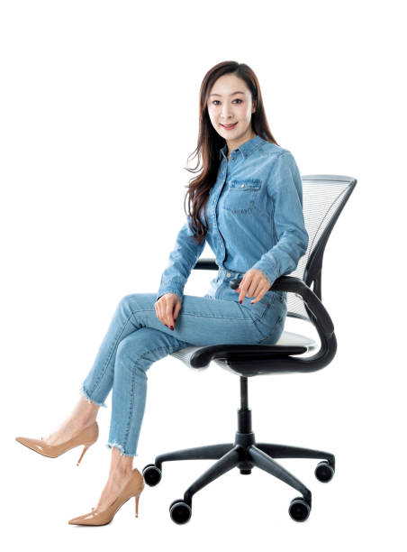 Woman sitting on office chair.