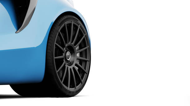 istock blue sportscar rear wheel isolated on white 1292376746