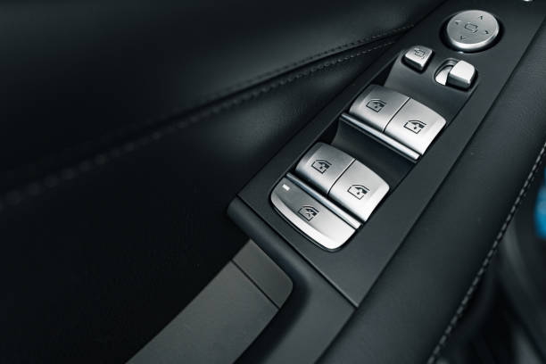 istock Window lifter button in a luxury car 1292377559