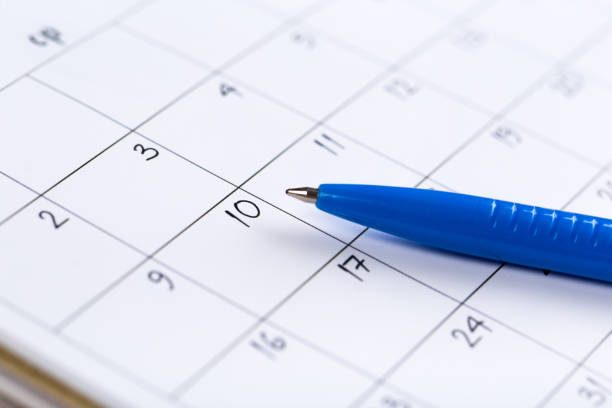 istock white calendar page for 2021 month schedule to make an appointment or manage the schedule every day with ballpoint pen for marks, for work planning and life concept 1292377795