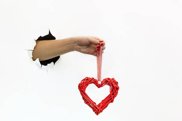istock Hand holding a red heart 1292377834