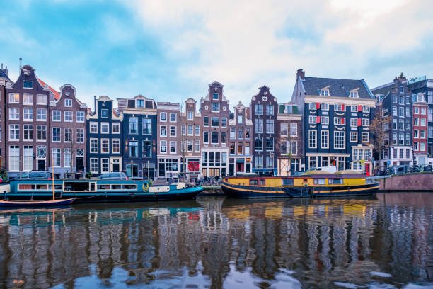 istock Amsterdam Netherlands, canals with lights during evening in December during wintertime in the Netherlands Amsterdam city 1292378045