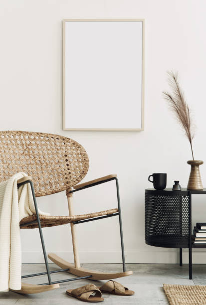 istock Modern scandinavian home interior with design wooden commode, mock up poster frame, decoration and personal accessories in stylish home decor. Template. 1292379182
