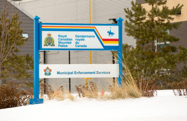 Royal Canadian Mounted Police Sign Stock Photo A RCMP sign outside the Fort Saskatchewan, Alberta, headquarters. Taken on December 19, 2020. police station canada stock pictures, royalty-free photos & images