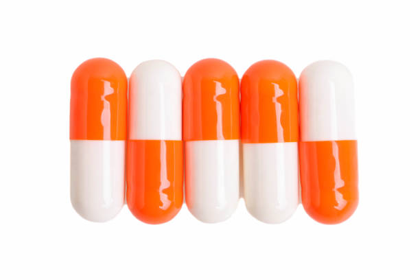 istock Vitamins, medicine in a white and red capsule 1292383570