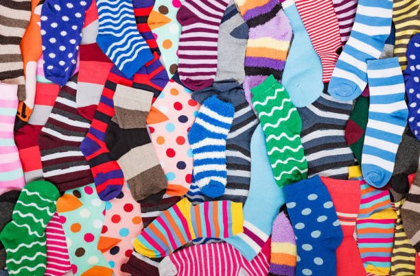 Different multicolored bright socks. Abstract background image. stock photo