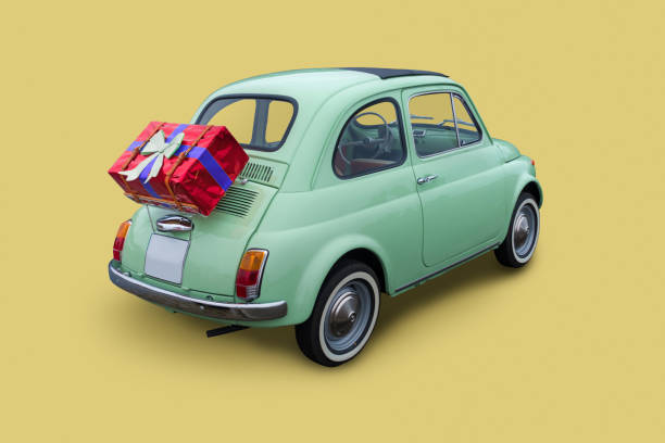 istock small old car bringing a gift or present for birthday or christmas 1292386432