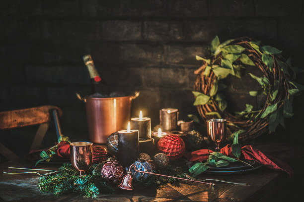 istock Christmas eve holiday festive table setting with champagne and candles 1292387023