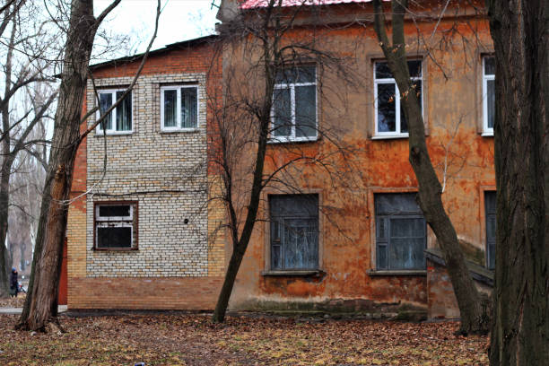 istock abandoned house on autumn background 1292390815