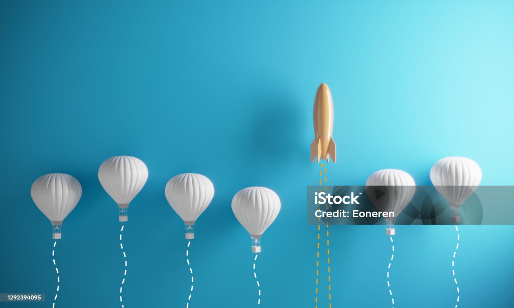 Innovation - Standing Out From The Crowd Orange colored rocket rising on the top between the hot air balloons. ( 3d render ) Change Stock Photo