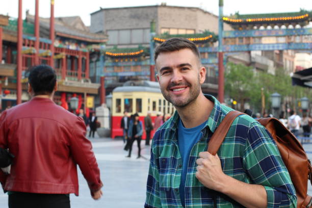 istock Caucasian tourist in Asian background 1292394215