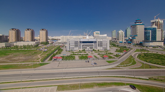 Top view over the city center and central business district Timelapse with traffic on road from rooftop, Kazakhstan, Astana, Central Asia 4K