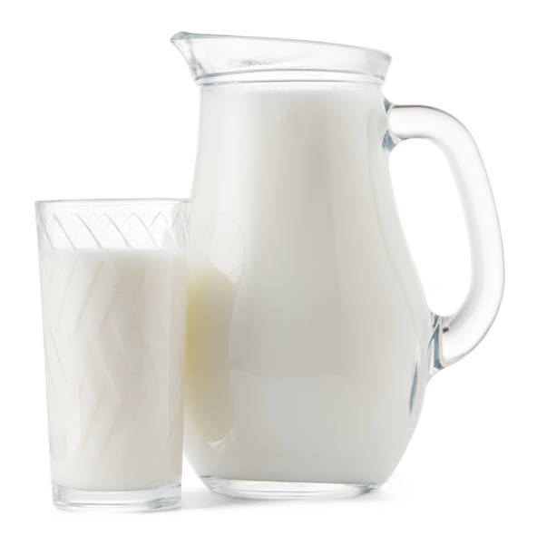 istock Glass jar and cup of fresh milk isolated 1292396643