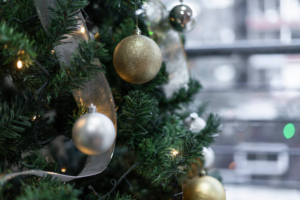 istock Tree decoration without people only tree, balls, ribbon, mesh and lights perfect for wallpaper 1292398015