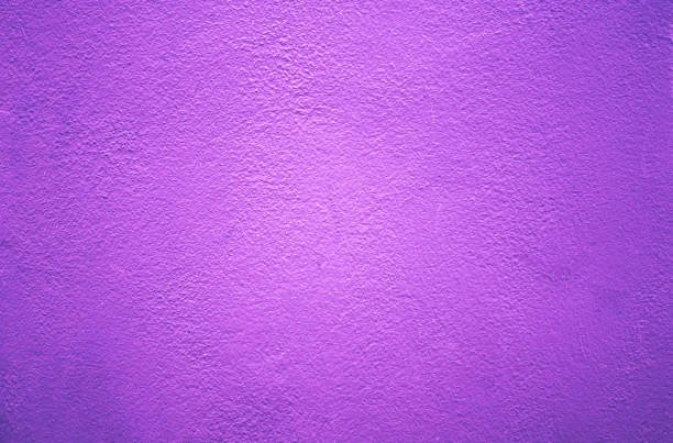istock purple wall background and texture. purple background. purple cement or concrete wall texture for background. High resolution through process retouch. Painted concrete wall texture in pastel color. 1292399705