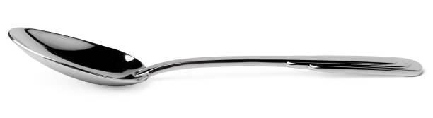 istock Metal steel spoon isolated on white background 1292400790