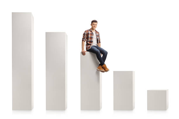 istock Young casual man sitting on the middle white column 1292400826