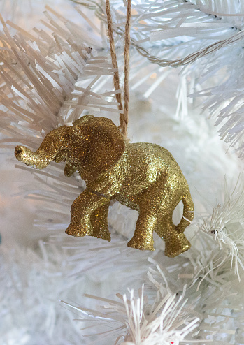 Elephant Christmas Tree Ornament covered in gold glitter