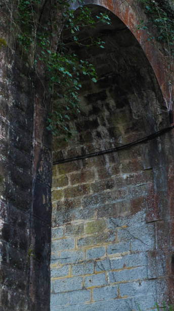 istock Arch of a stone bridge 1292402351