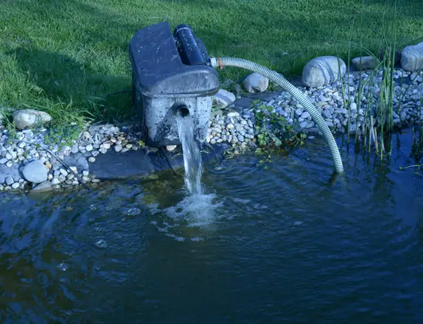 Photo of water pump for garden pond before cleaning