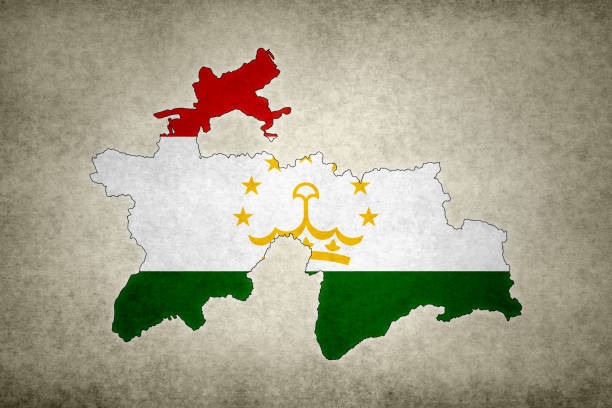 Grunge map of Tajikistan with its flag printed within its border on an old paper.