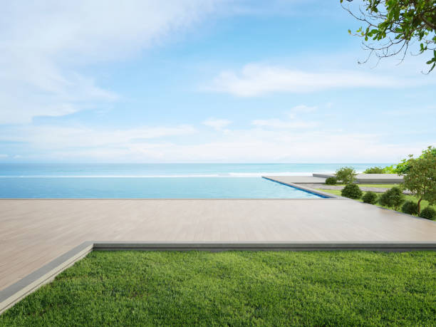 maison de plage de luxe avec piscine de vue sur la mer et terrasse dans le design moderne. - sparse outdoors contemporary patio photos et images de collection