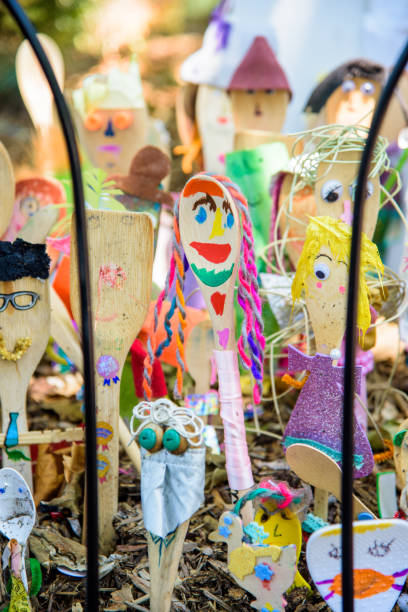 istock Colourful handcrafted spoon characters in Melbourne's nature strips 1292404606
