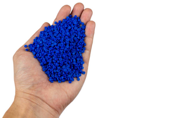 istock Close-up of plastic polymer granules. hand hold Polymer pellets. polymer plastic. compound polymer. 1292406053