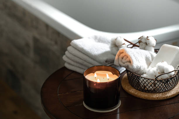 istock Spa composition with candles and bath accessories. 1292407558