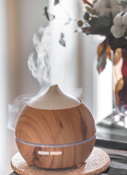 istock Modern oil aroma diffuser close up on a blurred background. 1292408056