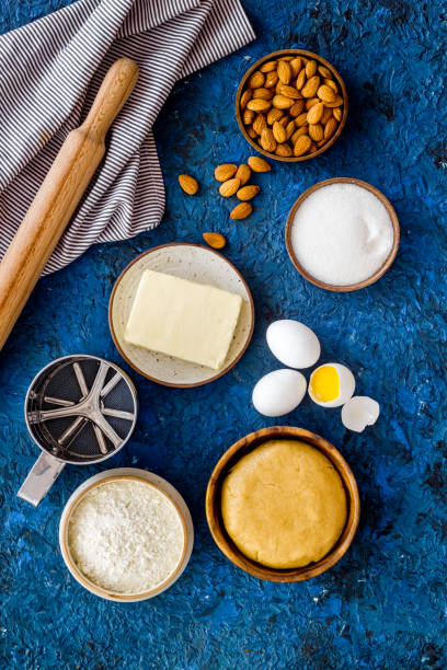 istock Baking ingredients for pastry with flour, butter and eggs, biscuits 1292408920