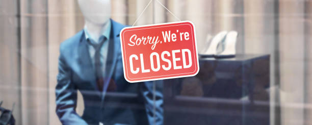 istock Closed shop with red sign on window 1292409931