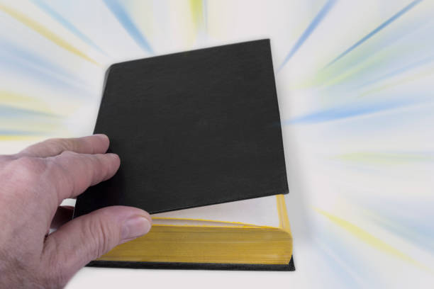 istock Black cover book on a white background 1292410044