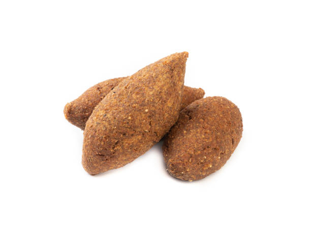 istock Traditional arabic fried kibbeh isolated over white background. Typical brazilian snack 1292412041