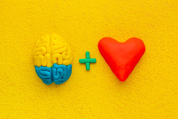 istock Think with love - heart and brain concept, top view 1292414676