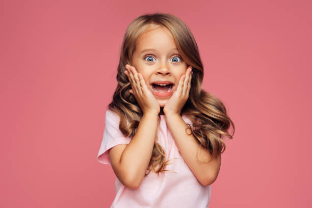 istock Funny girl on pink background 1292415323