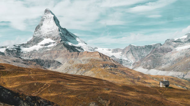 istock small cabin contrasting against Matterhorn mountain 1292417063