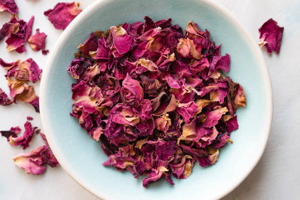 istock Dried Rose Petals in a Bowl 1292417278