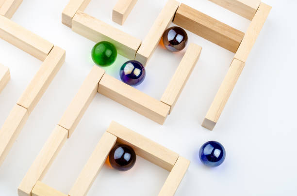 istock Concept - balls in a maze 1292418550