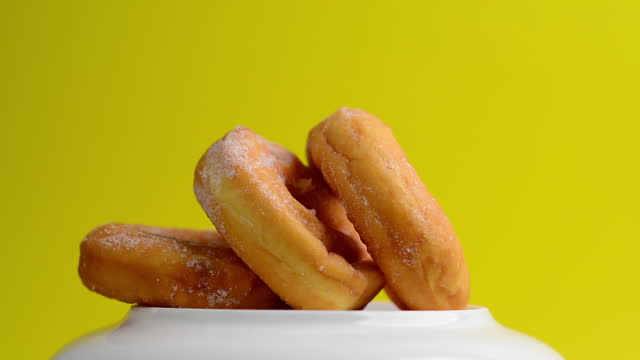 Donut snacks sweet snacks troll yellow background Dessert video