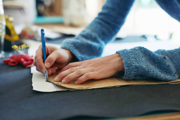 istock Getting her fabric ready to be cut and assembled 1292420961