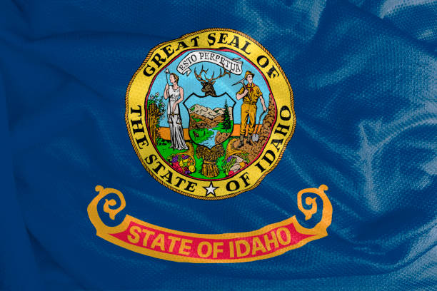 istock Idaho flag waving from textured fabric 1292420967