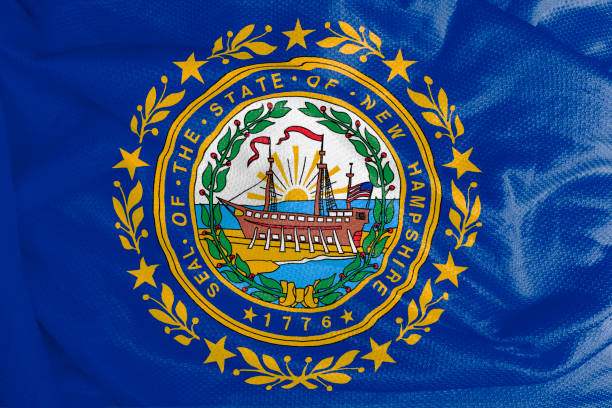 istock New Hampshire flag waving from textured fabric 1292421117