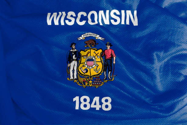 istock Wisconsin flag waving from textured fabric 1292421138