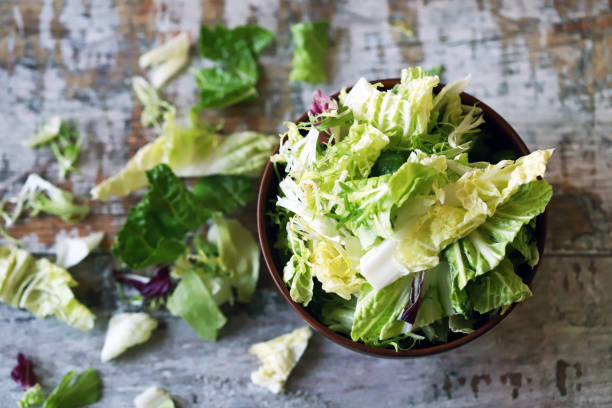 istock Fresh mix of salads in a bowl. 1292422268