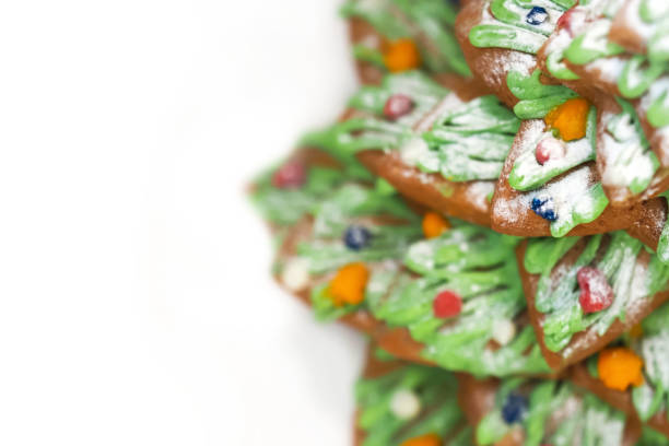Homemade christmas gingerbread spruce isolated on white background, copy space. Gingerbread christmas tree, spruce