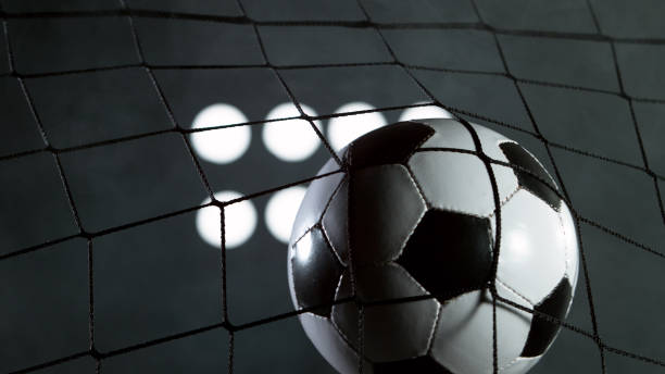 istock Soccer ball flying into net, goal success concept. 1292426933