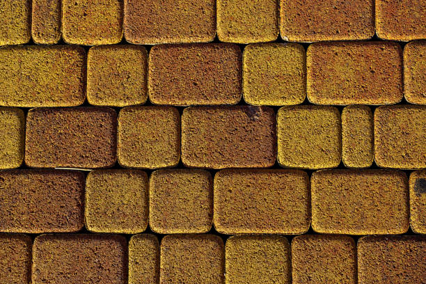istock background stone pavement. road paved with cobbles. texture of bricks. 1292427464